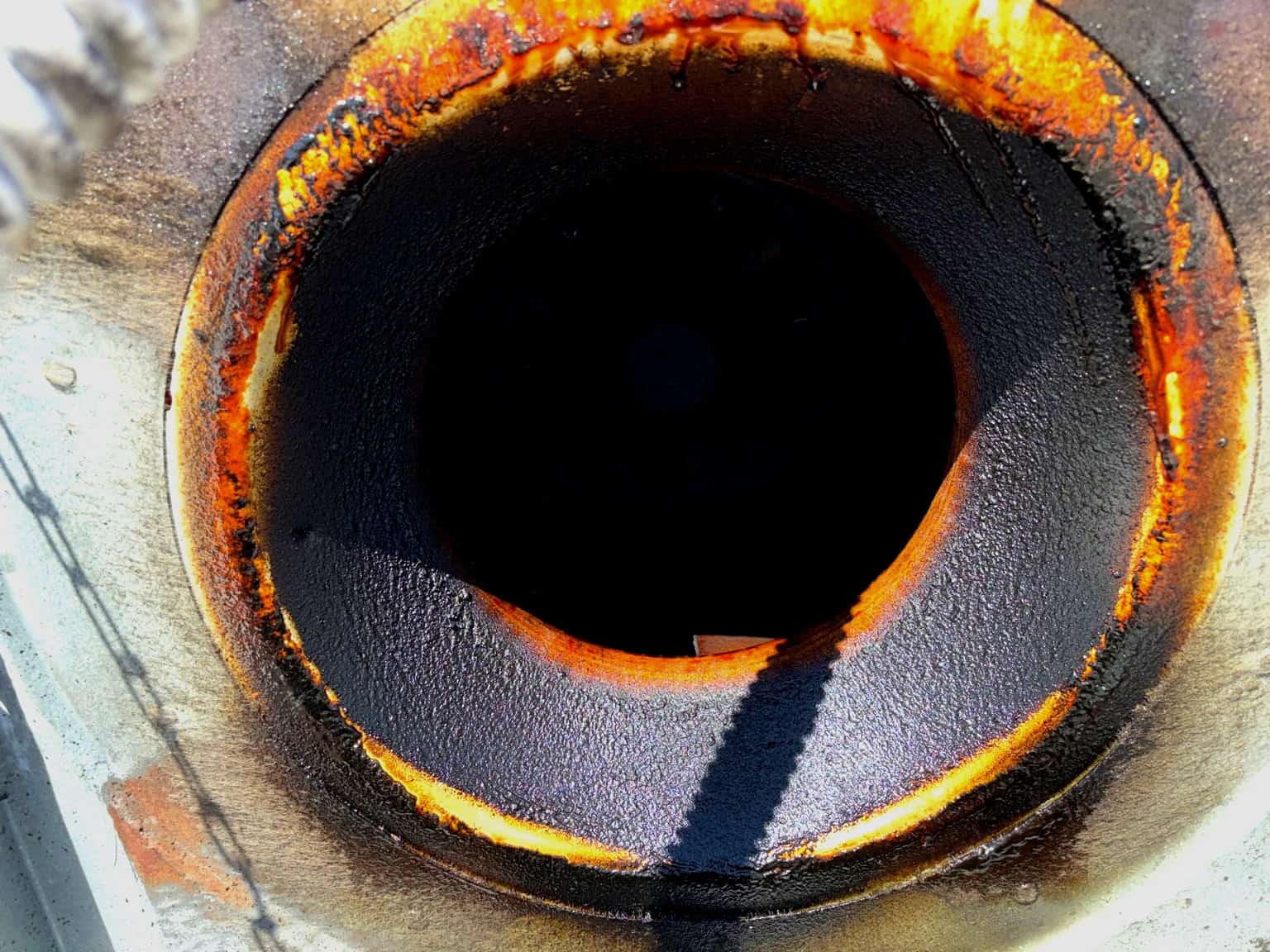 Fan before cleaning — heavy grease buildup