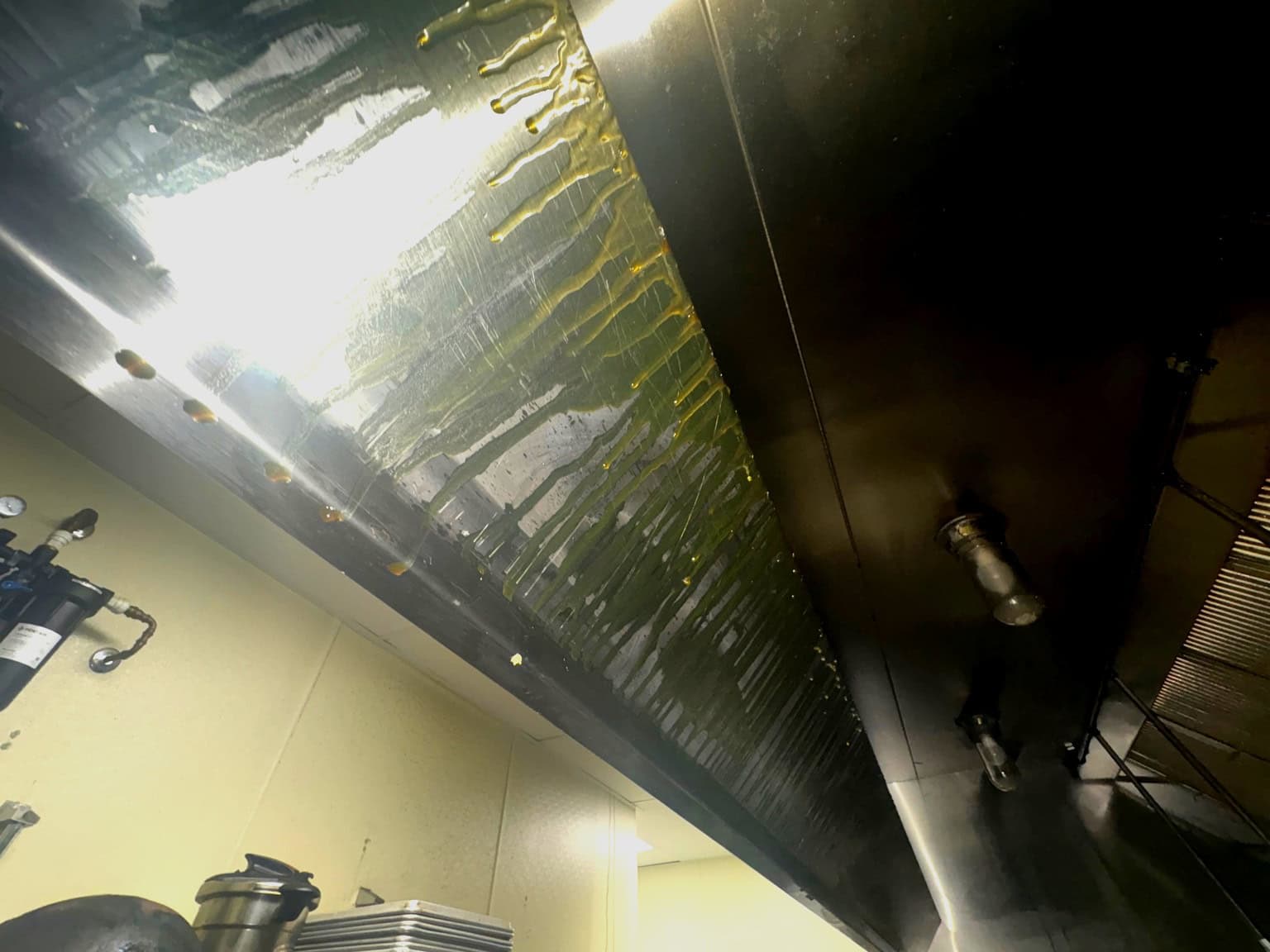 Hood before cleaning — grease buildup